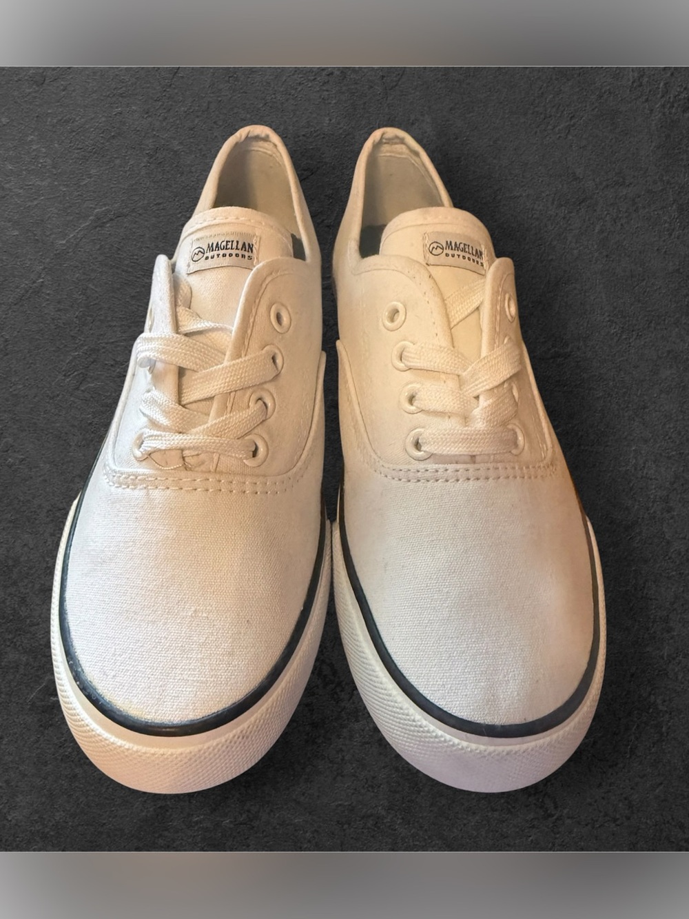 Women’s white canvas lace-up sneakers from Magellan Outdoors.